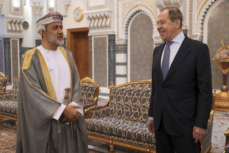Mr Lavrov and Sultan Haitham talk during their meeting at Al Alam palace.  AP Photo
