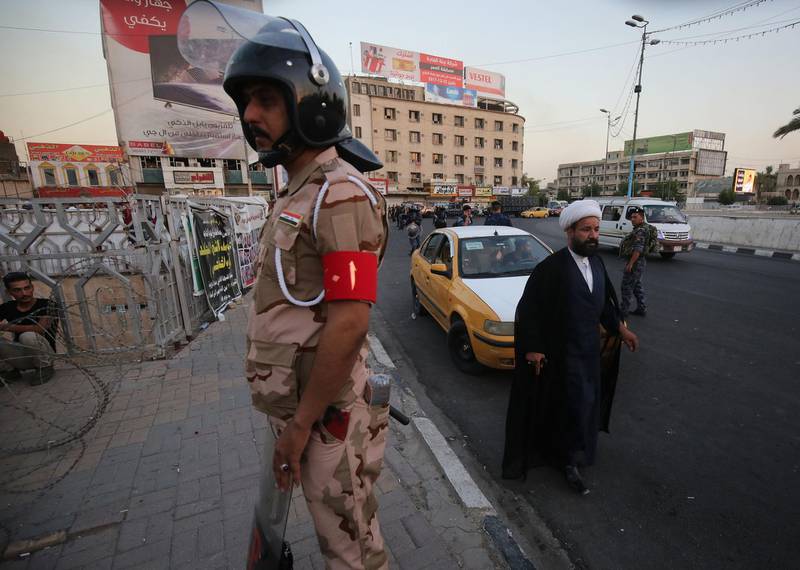 Members of the Iraqi security forces are deployed in the capital Baghdad's Tahrir Square during demonstrations. AFP