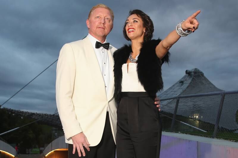 Becker poses with his wife Lilly Becker at an awards ceremony in Munich in 2013. The couple separated in 2018. Getty Images