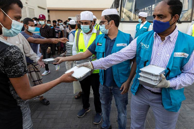 The Sri Lanka community along with the help of the Watani Al Emirate Foundation collectvely distributed two thousand / 2000 Iftar meals to workers in the Sonapur area of Dubai to mark International Workers Day on May 1st, 2021. Antonie Robertson / The National.Reporter: None for National