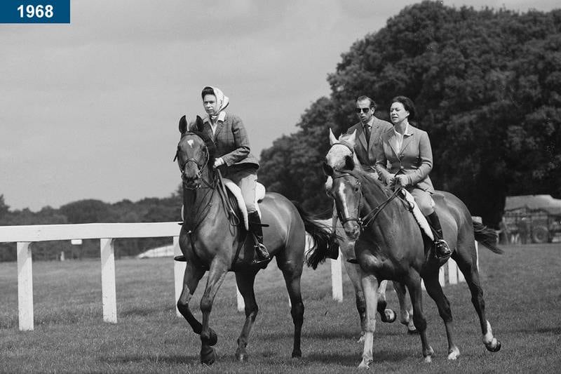 1968: The queen, Princess Margaret, and Prince Edward, Duke of Kent, riding at Ascot Racecourse.