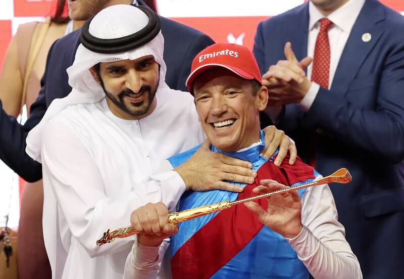Sheikh Hamdan bin Mohammed, Crown Prince of Dubai, with Frankie Dettori, the winning jockey on Country Grammer in the Dubai World Cup. Chris Whiteoak / The National