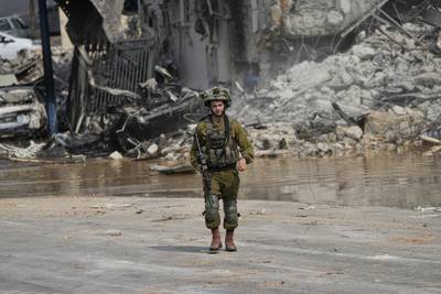An Israeli soldier on patrol in Sderot after an attack by Hamas. AP