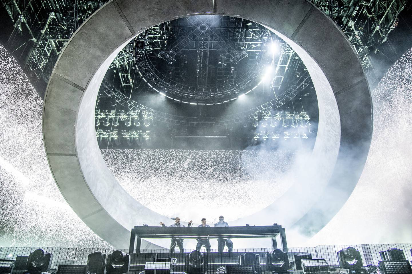 Swedish House Mafia unveiled their new stage set design, featuring a circular structure resembling a flying saucer, at the 2022 Coachella Valley Music And Arts Festival. AP
