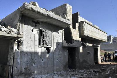 A handout picture released by the official Syrian Arab News Agency (SANA) on January 22, 2021, shows a building damaged by reported Israeli strikes on the Syrian province of Hama. - The Syrian Observatory for Human Rights said the Israeli raids targeted Syrian military sites and resulted in the "destruction" of five of them in an area of Hama where Iran-backed fighters are present.
But the war monitor said the civilians were killed by "debris from one of the Syrian anti-aircraft defence missiles that fell on a house in a densely populated neighbourhood". (Photo by STRINGER / SANA / AFP) / == RESTRICTED TO EDITORIAL USE - MANDATORY CREDIT "AFP PHOTO / HO / SANA" - NO MARKETING NO ADVERTISING CAMPAIGNS - DISTRIBUTED AS A SERVICE TO CLIENTS ==