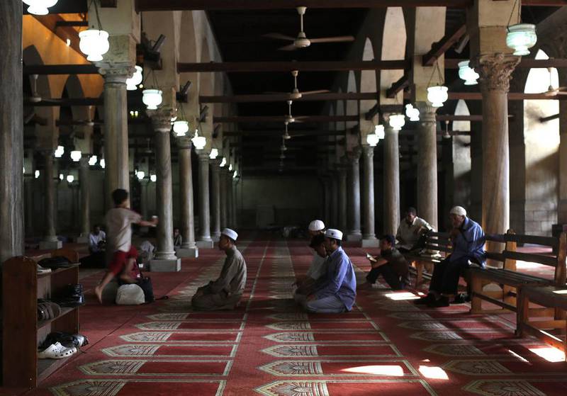 Muslims pray at al-Azhar mosque hours before breaking their fast during the holy month of Ramadan in Cairo. Asmaa Waguih / Reuters
