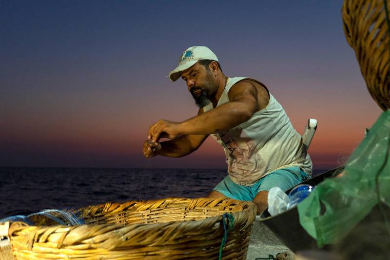 Fishermen at work on Tuesday, 15 Sep 2020, off the coast of Byblos , Lebanon. (Matt Kynaston)