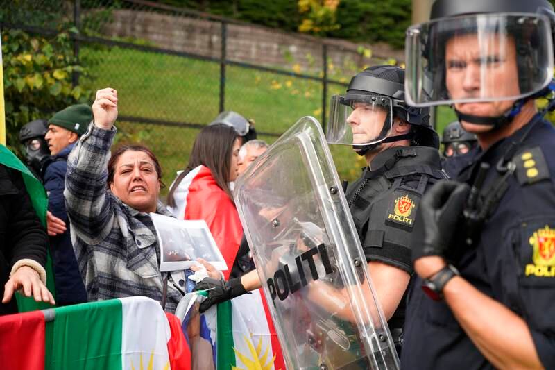 Police block protesters from entering Iran's embassy in Oslo, Norway. EPA 