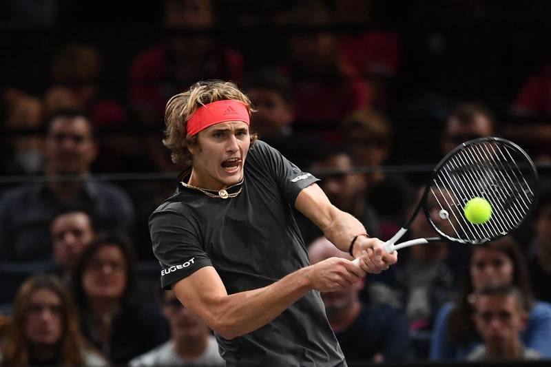 Germany's Alexander Zverev returns the ball to Russia's Karen Khachanov during their men's singles quarter-final tennis match on day five of the ATP World Tour Masters 1000 - Rolex Paris Masters - indoor tennis tournament at The AccorHotels Arena in Paris, on November 2, 2018. / AFP / Anne-Christine POUJOULAT            
