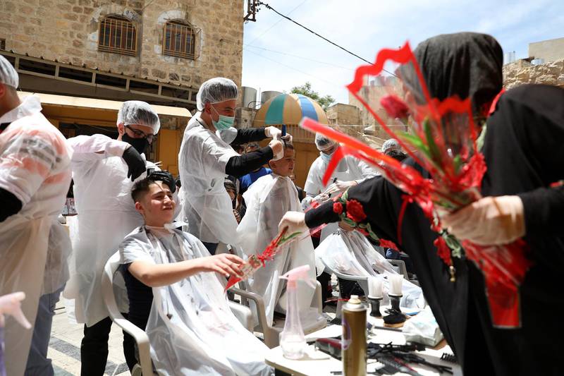Measures taken by the Palestinian Authority amid concerns over the spread of coronavirus prevent hairdressers from opening their barbershops. EPA