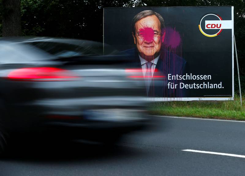 Paint is splattered on a potser of the CDU's Armin Laschet in Cologne. Photo: Reuters
