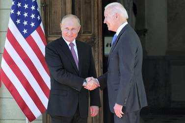 Russian President Vladimir Putin shakes hands with his US counterpart Joe Biden in Geneva. AP 