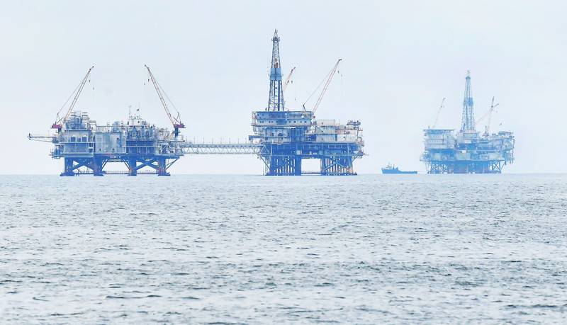 Drilling platforms are seen off the southern California coast. Opec also revised lower liquids supply this year from countries outside of its group. Non-Opec supply growth has been revised by 300,000 bpd to reach 700,000 bpd for 2021. AFP