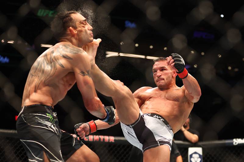 Michael Chandler kicks Tony Ferguson for the knockout at UFC 274. Reuters
