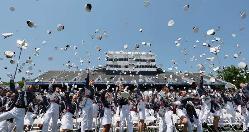 United States Military Academy cadets mark their graduation by tossing their hats in the air at West Point in New York. EPA