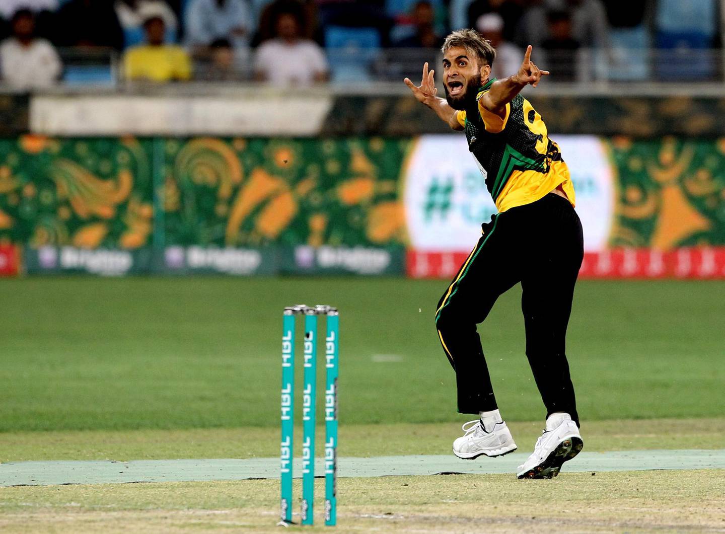 Dubai, Feb 25, 2018: Imran Tahir of Multan Sultan celebrates after dismissing Andre Russell during their match against Islamabad United during the Pakistan Super League 2018 at the Dubai International Cricket Stadium. Satish Kumar for the National / Story by Paul Radley