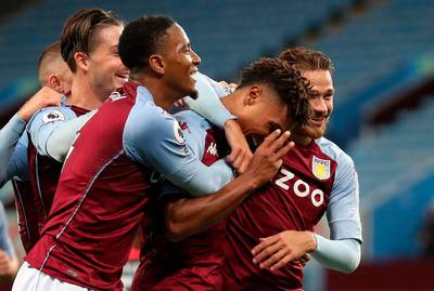 Ollie Watkins, second right,celebrates with team mates after scoring his third, and Villa's fourth, goal. EPA