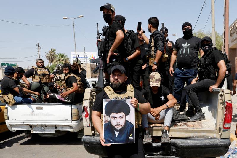 Followers of Iraqi cleric Moqtada Al Sadr near the Green Zone in Baghdad, Iraq, August 30, 2022. Reuters