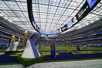A tribute to Queen Elizabeth is displayed before a Los Angeles Rams football game. AP