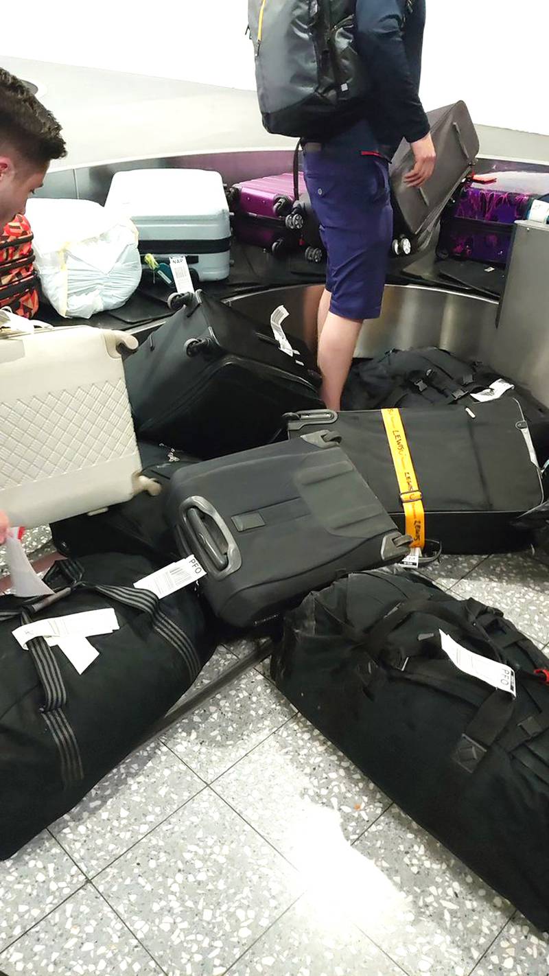 Luggage piles up on the floor at Bristol airport after a flight to Naples with Easy Jet was cancelled on Saturday. PA