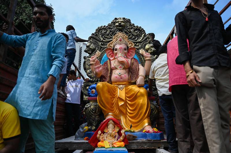 Another idol of the Hindu deity is paraded on a float on the first day of Ganesh Chaturthi in Mumbai. AFP