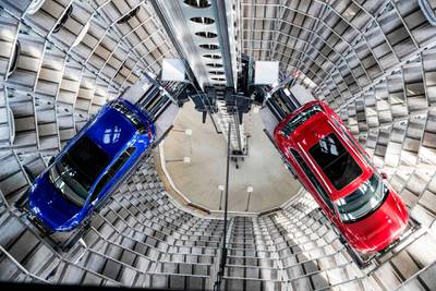 (FILES) In this file photo taken on March 14, 2017 German carmaker Volkswagen's cars are seen at the storage facility auto tower at the company headquarters in Wolfsburg.   
The world's largest carmaker Volkswagen said on February 23, it more than doubled net profits in 2017 compared with the previous year, booking an 11.4-billion-euro ($14 billion) bottom line. / AFP PHOTO / Odd ANDERSEN
