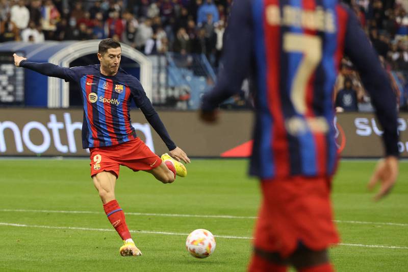 Barcelona forward Robert Lewandowski takes a shot. AFP