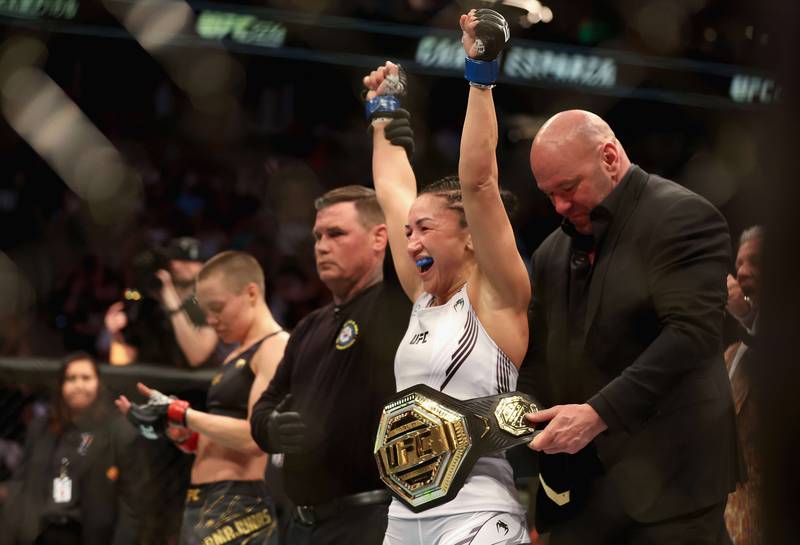 Carla Esparza celebrates after her victory over Rose Namajunas at UFC 274. Getty
