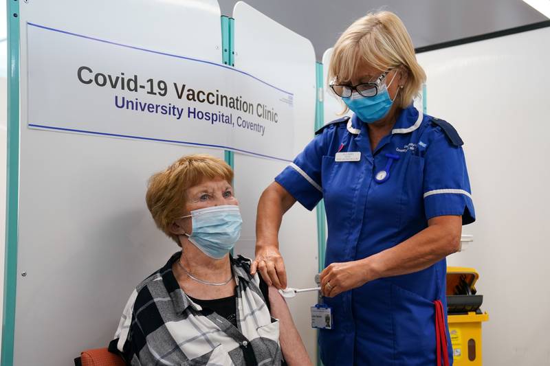 Margaret Keenan, the first person to receive the coronavirus vaccine in December last year, receives her booster jab at University Hospital Coventry. Getty Images