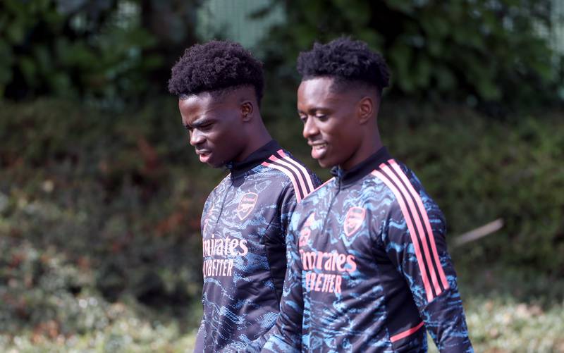 Arsenal's Bukayo Saka, left, and Albert Sambi Lokonga during training. PA