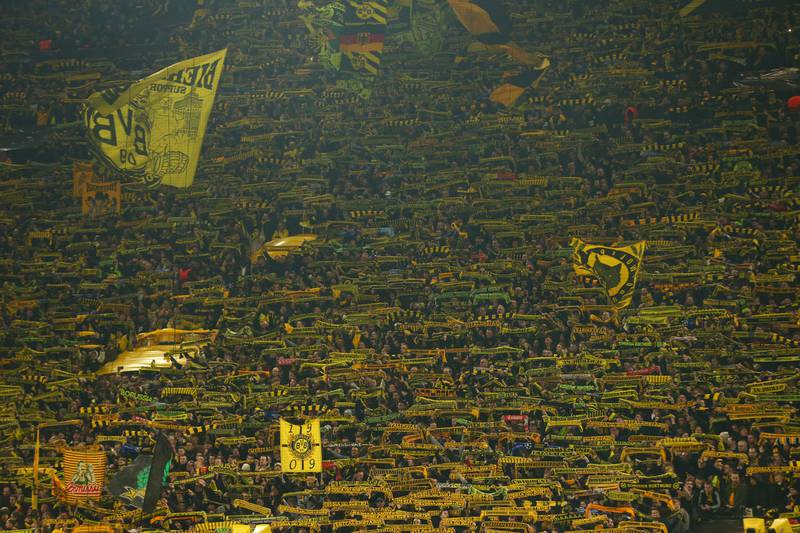 Borussia Dortmund fans inside the stadium with their yellow wall. Reuters