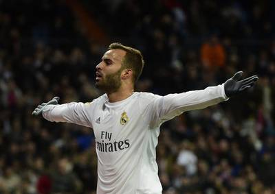 Real Madrid’s forward Jese Rodriguez celebrates after scoring during the Spanish league football match Real Madrid CF vs Sevilla FC at the Santiago Bernabeu stadium in Madrid on March 20, 2016. AFP / PIERRE-PHILIPPE MARCOU