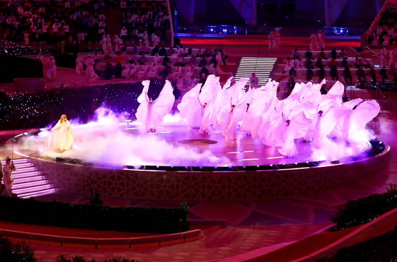In the pink with a splash of colour as the event starts with a bang. Photo: Reuters
