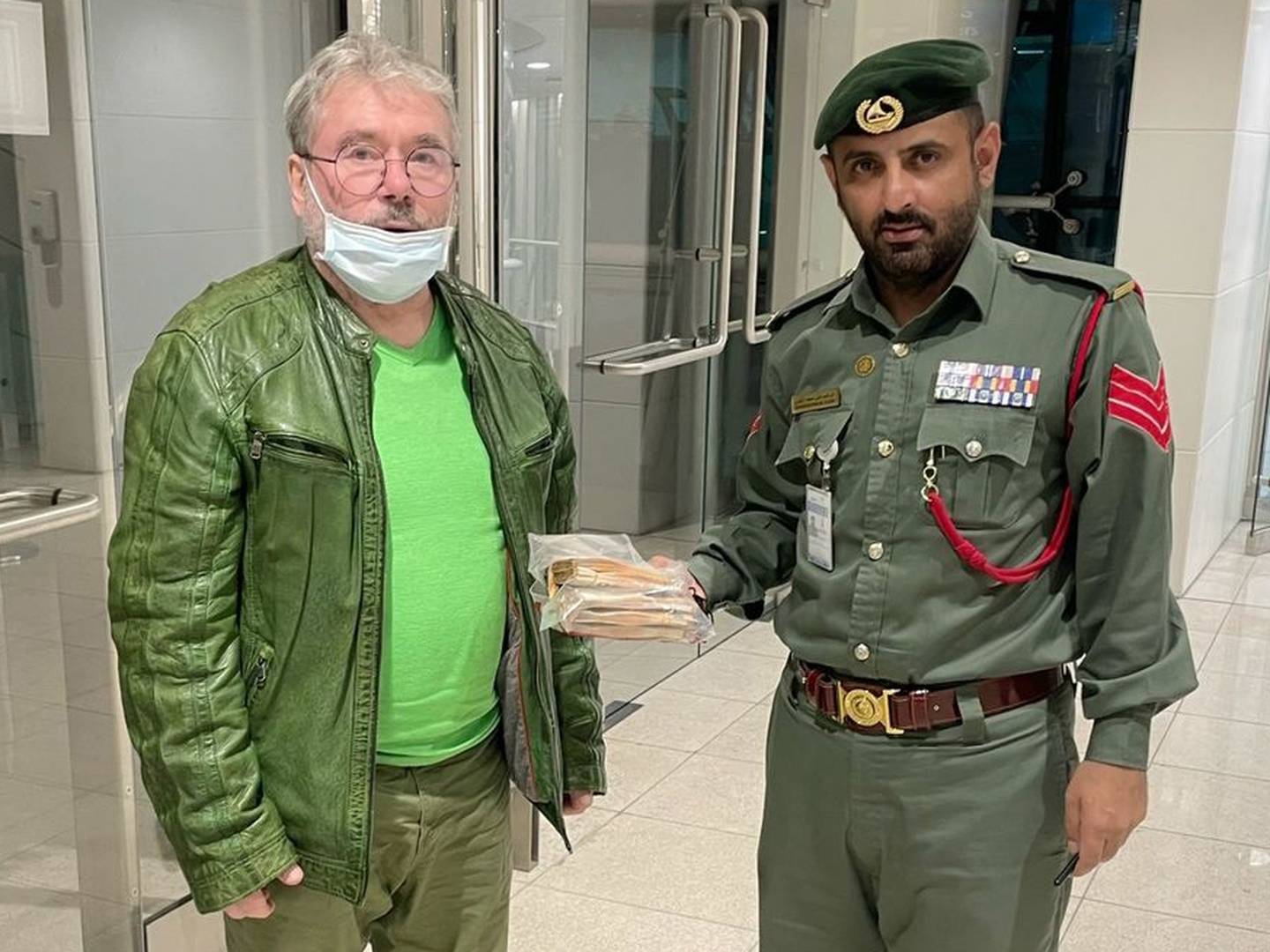 A German passenger in Dubai receives a pleasant surprise as police return 33,600 euros ($37,990) he had lost. Photo: Dubai Police