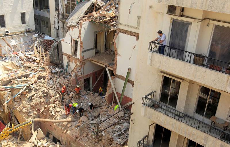 Rescue team search through rubble of buildings damaged due to the massive explosion at Beirut's port area, in Gemmayze, Lebanon. REUTERS
