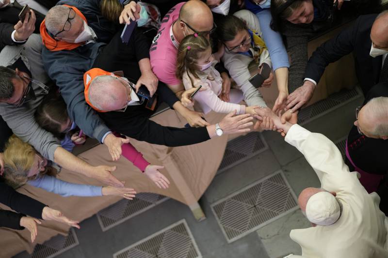 Pope Francis leaves at the end of an audience with members of the devotional Madonna of Tears community in Treviglio, northern Italy. AP 