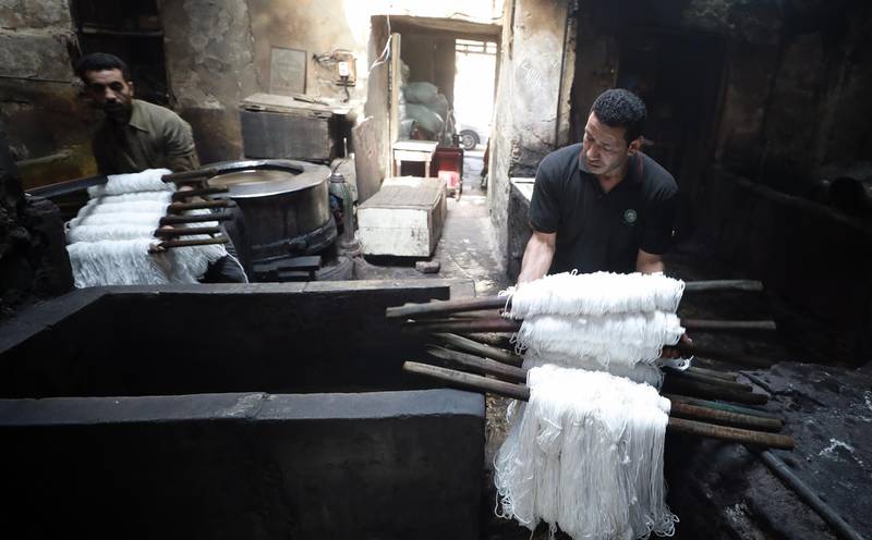 The fabric is used for everything from handmade shoes and suits to rugs and curtains. EPA / Khaled Elfiqi