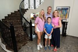 Julie Grobler with her husband, Hugo, and their children, Jenna, 15, and Grayson, 10, in their rented four-bedroom villa in Al Barsha South, Dubai. Chris Whiteoak / The National