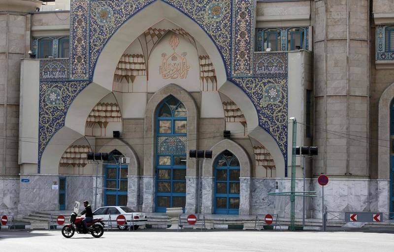 A photograph taken on March 13, 2020 shows the entrance of a mosque that remains shut in the Iranian capital Tehran, after measures were taken to slow down the spread of the coronavirus COVID-19.  The outbreak of the virus in Iran is one of the deadliest outside China, where the disease originated. Several politicians and officials both sitting and former have been infected, with some dying from the illness. AFP