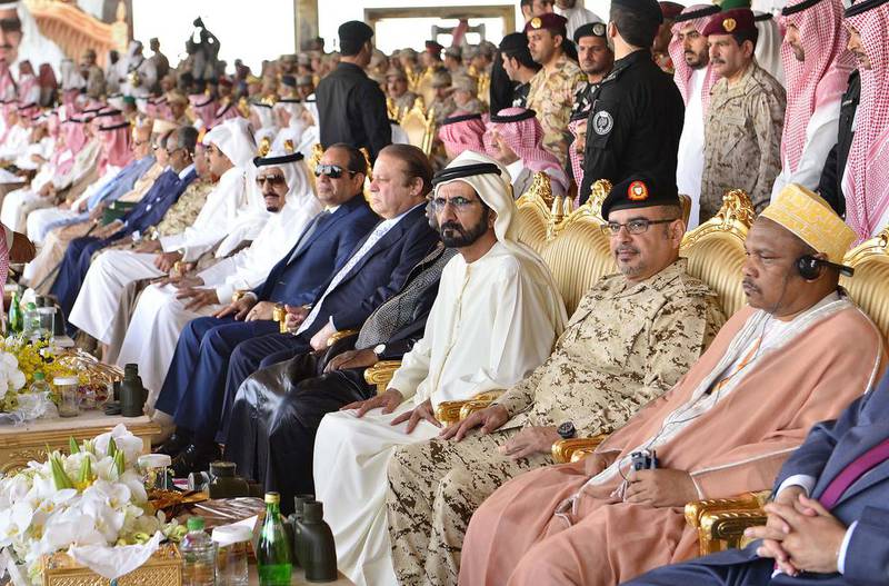 Sheikh Mohammed bin Rashid, Vice President and Prime Minister and Ruler of Dubai, sits alongside other regional leaders watching the conclusion of the Northern Thunder exercises in the northern Saudi desert. WAM
