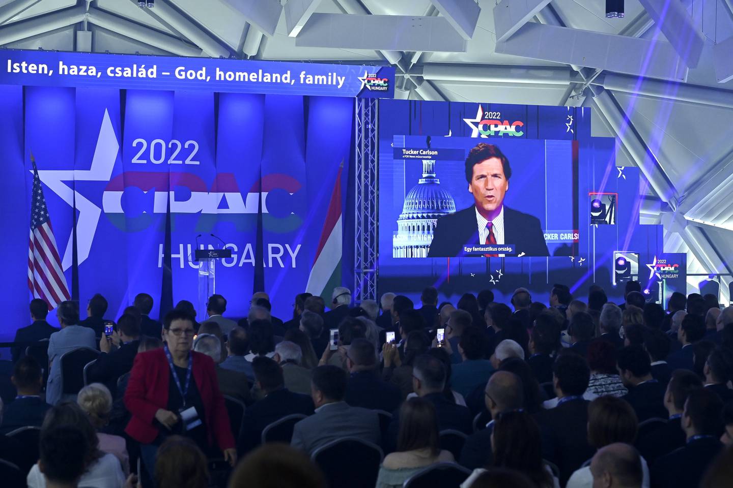 American television host Tucker Carlson delivers a speech at the CPAC conference in Budapest in May. AP Photo