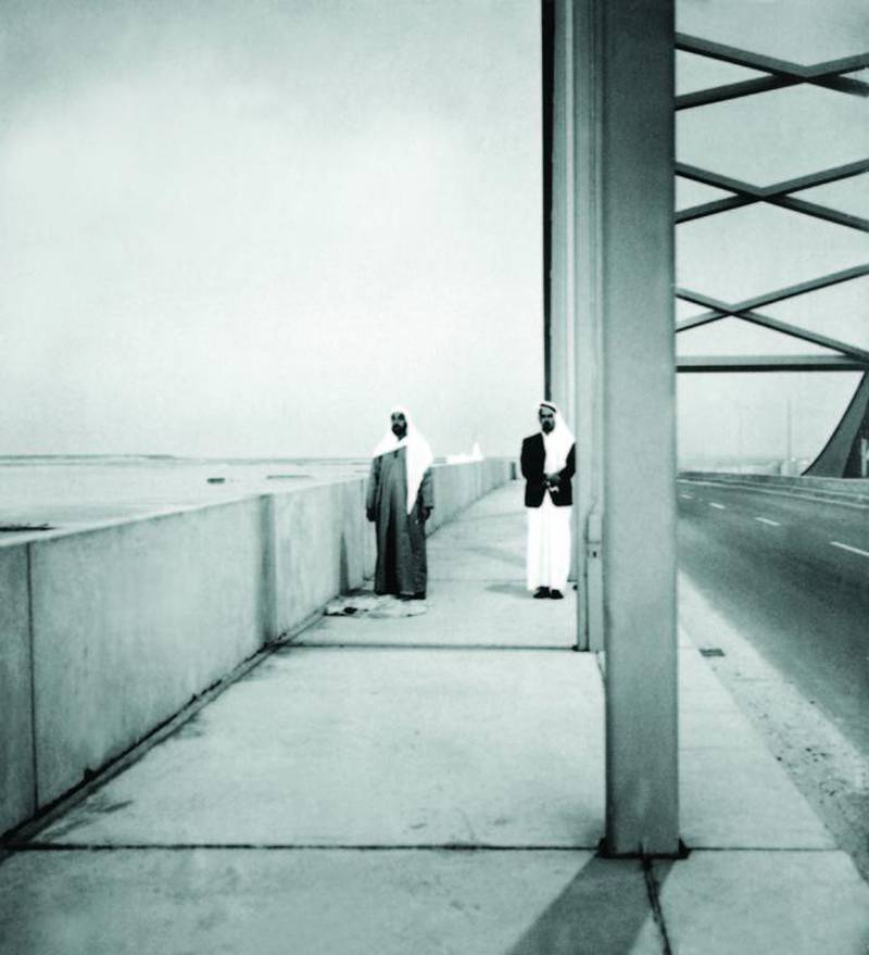 Performing prayers with Ahmed Al Suwaidi on the Al Maqta Bridge, which opened in 1968. National Archives