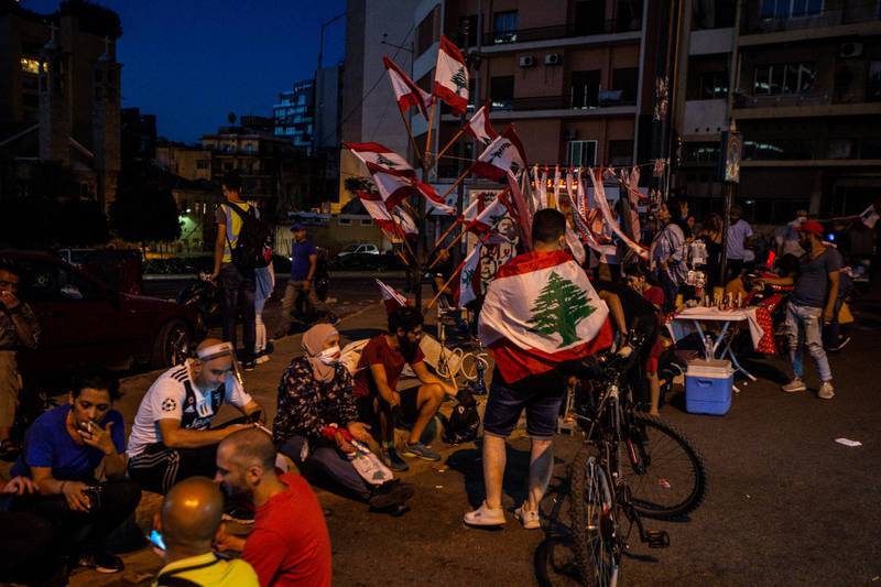Anti-government protesters gather as they try to block tabarize highway during a protest against the economic condition, the collapsing Lebanese pound currency and increasing prices in Beirut. EPA