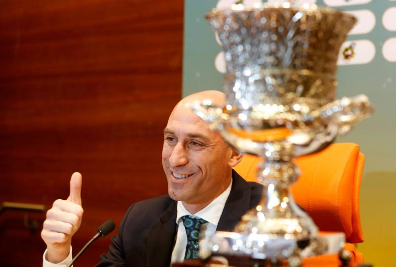Luis Rubiales, greets reporters at the start of the press conference to discuss the Spanish Super Cup. AP Photo
