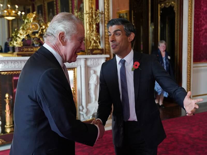 King Charles greets Mr Sunak at Buckingham Palace. Getty Images