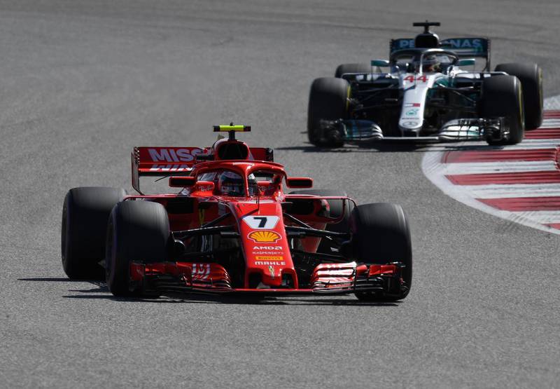 AUSTIN, TX - OCTOBER 21: Kimi Raikkonen of Finland driving the (7) Scuderia Ferrari SF71H leads Lewis Hamilton of Great Britain driving the (44) Mercedes AMG Petronas F1 Team Mercedes WO9 on track during the United States Formula One Grand Prix at Circuit of The Americas on October 21, 2018 in Austin, United States.  (Photo by Clive Mason/Getty Images)
