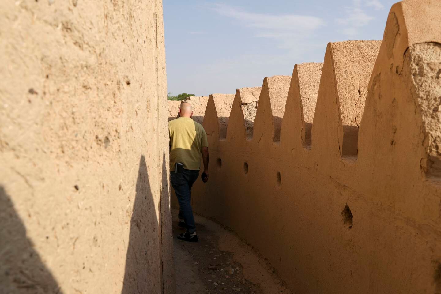 Al Jahili Fort is one of the UAE's most historic buildings, with walls made of mud, straw and fibres from palm trees. Khushnum Bhandari / The National 