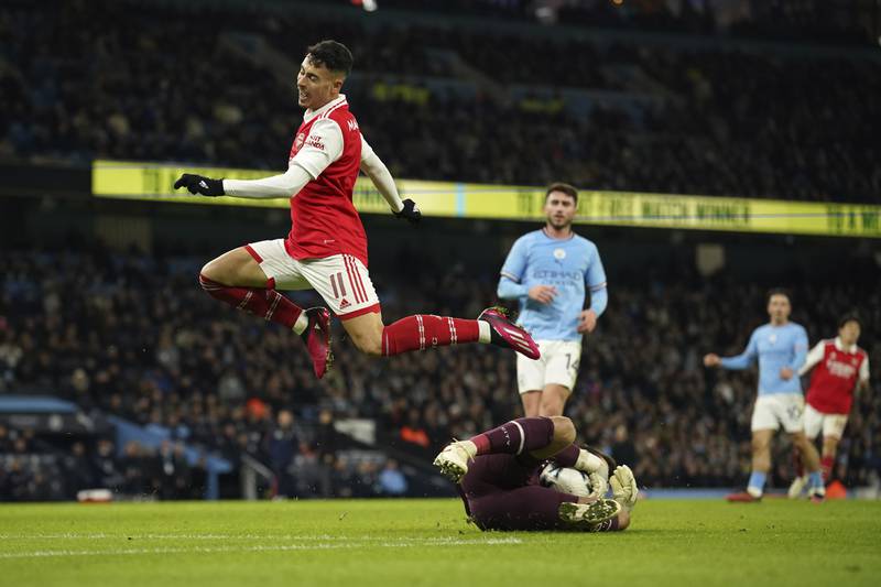 Manchester City's goalkeeper Stefan Ortega saves an attempt from Arsenal's Gabriel Martinelli. AP