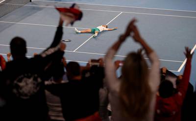 Spectators cheer Novak Djokovic after his victory in Australia. Reuters