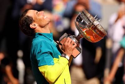 Rafael Nadal celebrates with the trophy. Getty